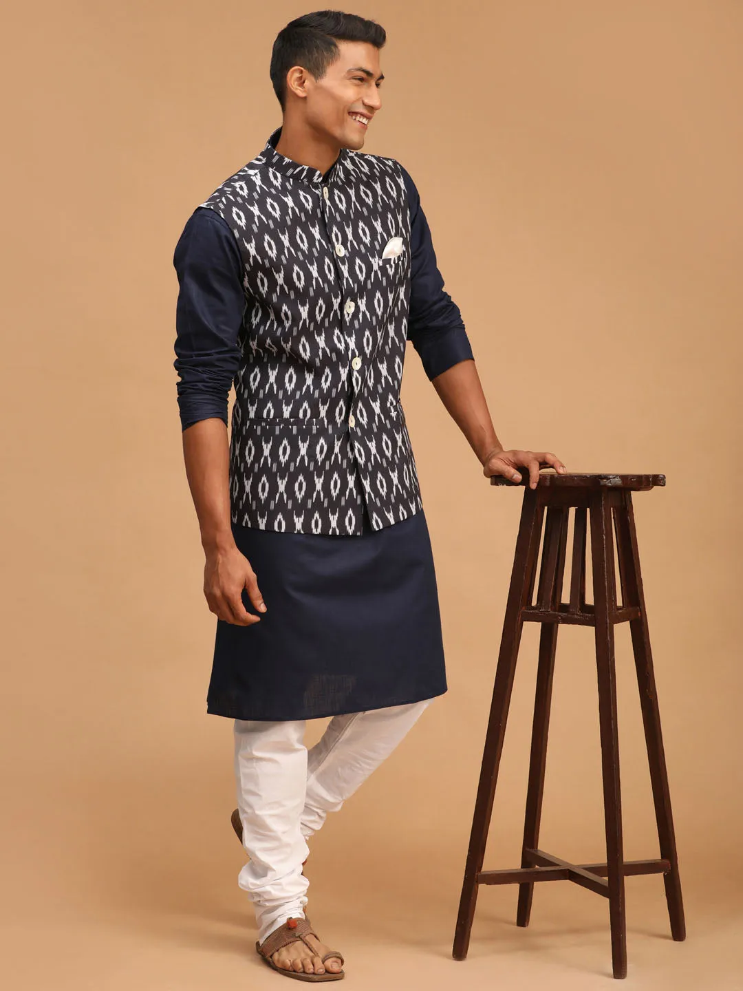 Jashvi Men's Black Ikkat Printed Cotton Nehru Jacket With Navy Blue Kurta And White Pyjama Set