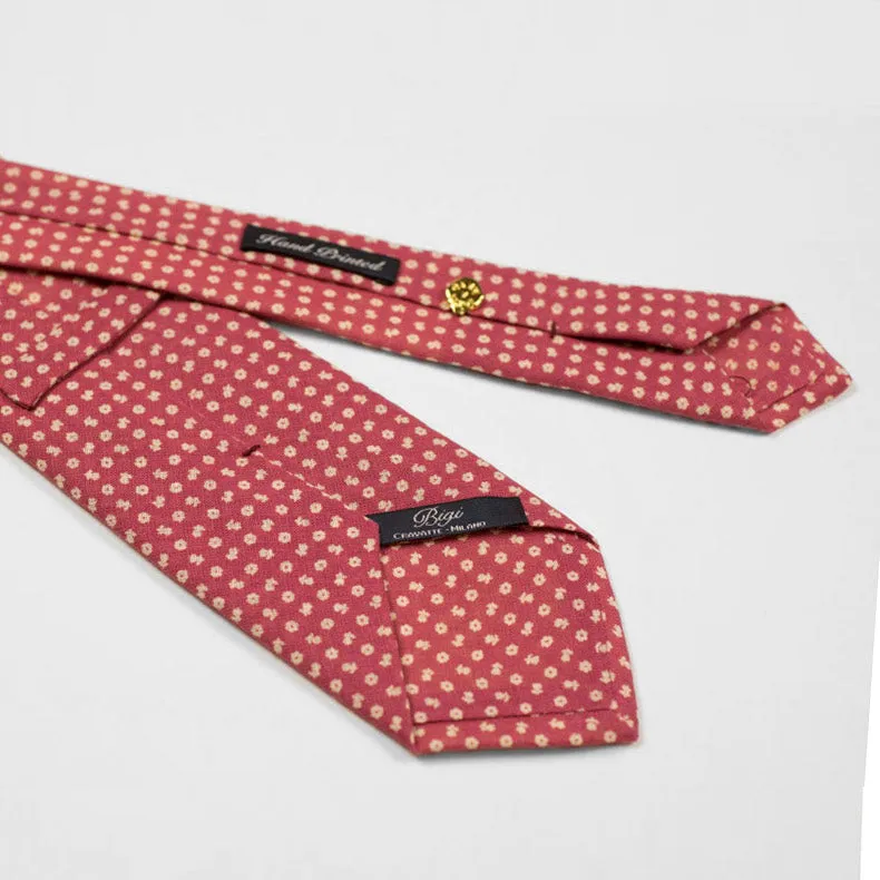 Rhubarb linen tie, white hand-printed flower motifs, self-tipped