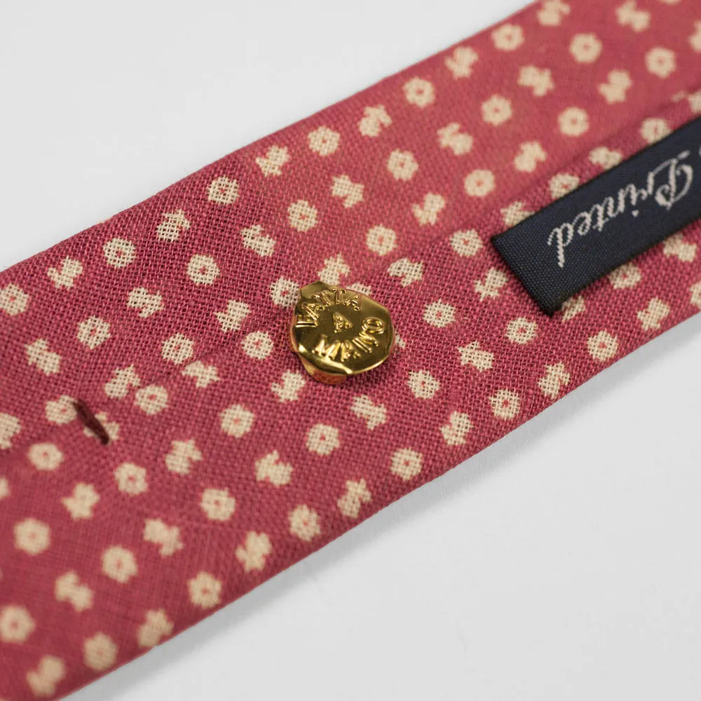 Rhubarb linen tie, white hand-printed flower motifs, self-tipped