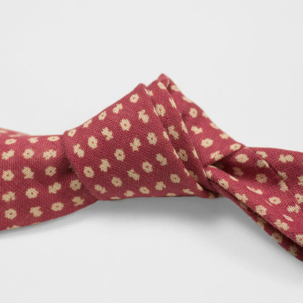 Rhubarb linen tie, white hand-printed flower motifs, self-tipped
