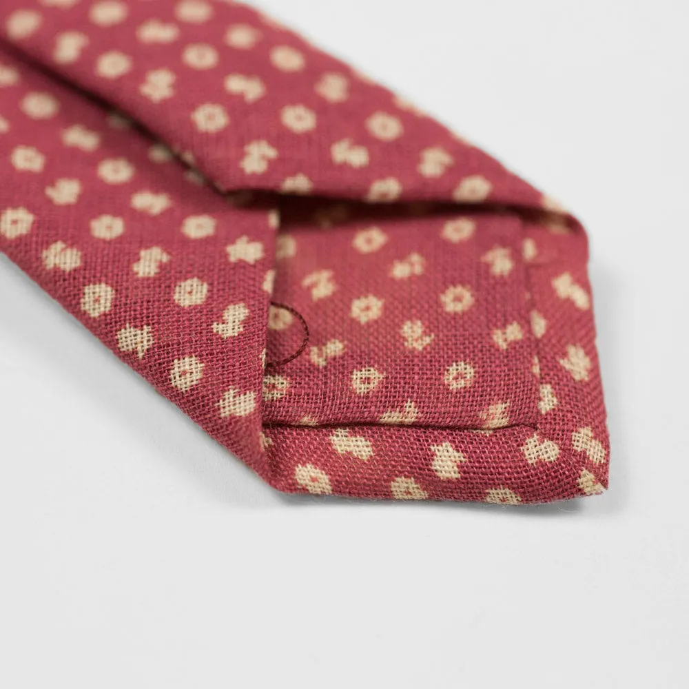 Rhubarb linen tie, white hand-printed flower motifs, self-tipped